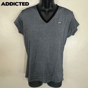 Addicted Metallic V Neck T Shirt XL / 36 runs small Gently worn 50% viscose